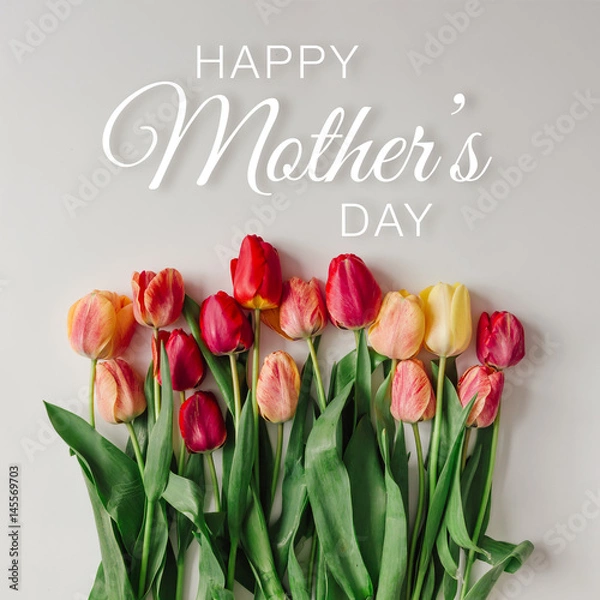 Fototapeta Happy Mothers day with tulips on white background. Flat lay.