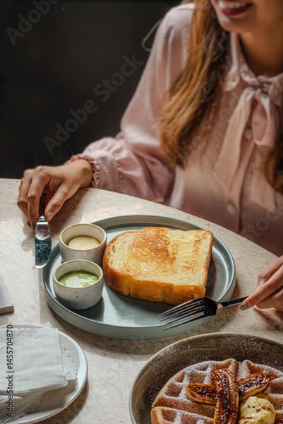 Fototapeta Buttery Toast with Spreads A Serene Breakfast Scene