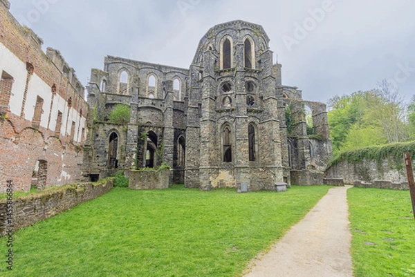 Fototapeta The outside of the apse of the church in the ruins of Villers Abbey, the remains of a Cistercian abbey abandoned in 1796