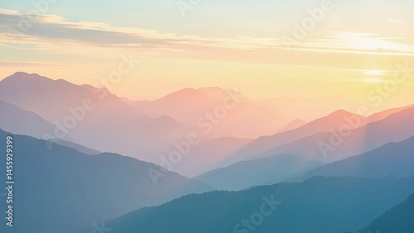 Obraz Serene mountain range silhouettes at sunrise or sunset with soft hues