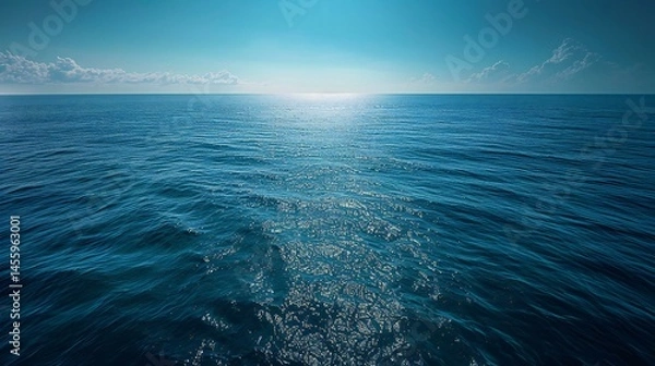 Fototapeta Featuring Calm ocean with blue waves under clear sky, high resolution.