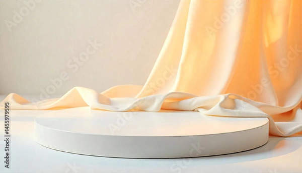 Fototapeta A white round platform with a beige silk cloth draped in the background, product display, minimalist aesthetic, soft lighting, elegant presentation, clean composition