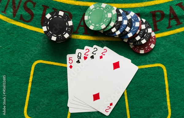 Fototapeta Poker cards with combination. The winning combination in a game in a poker club. The concept of luck in the poker game.