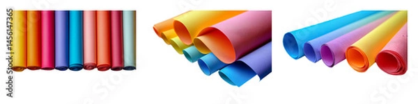 Fototapeta Three collections of rolled colorful craft paper in bright tones, isolated on a transparent background.