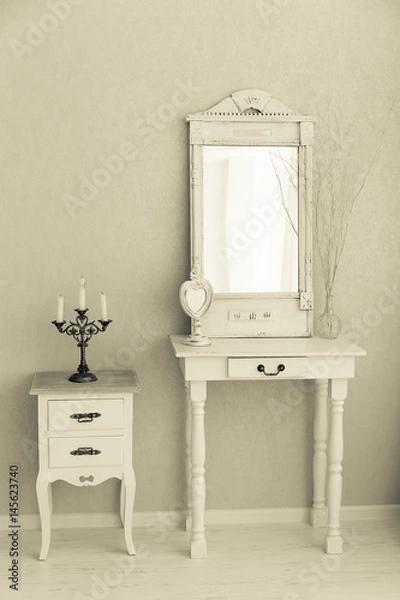 Fototapeta A old retro white dressing table, glass mirror.