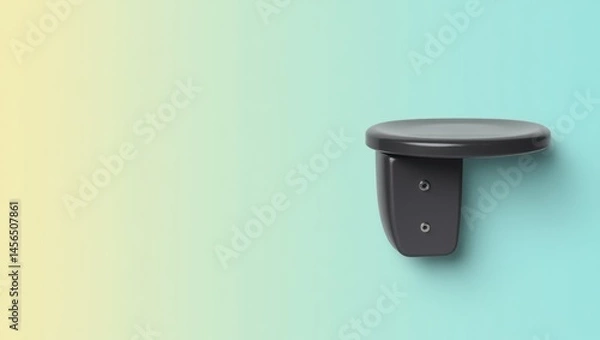 Fototapeta Wrist Rest. Simple Bathroom Comfort. Isolated background, copyspace.. Worn wrist rest leans against bathroom wall with black knob, exuding simple comfort solace.