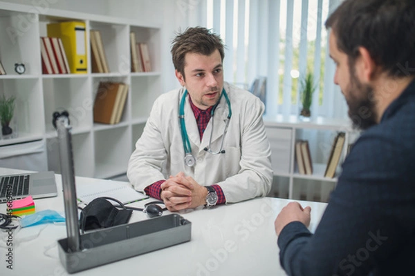 Obraz Patient and doctor talking about patients problems