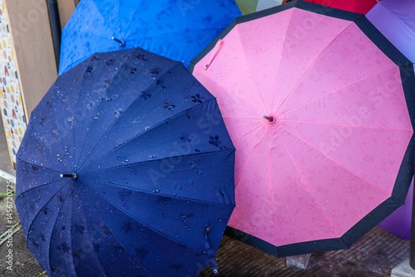 Fototapeta Colorful Umbrellas on a Rainy Urban Street