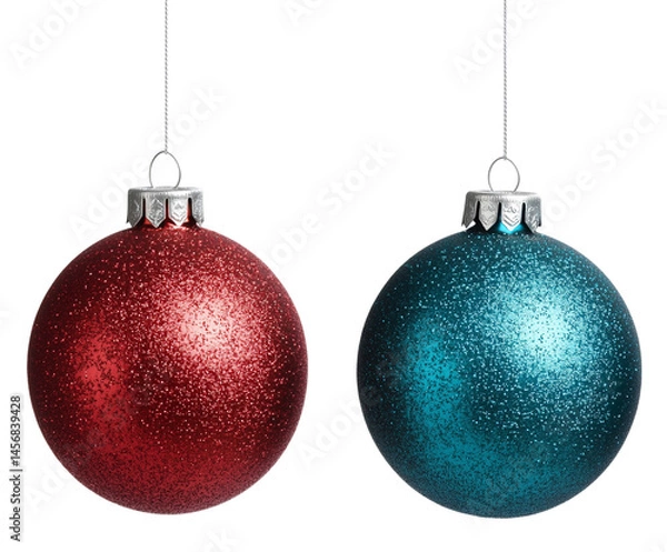 Fototapeta Shiny red and blue Christmas ornaments hanging together, adding festive touch to holiday decorations