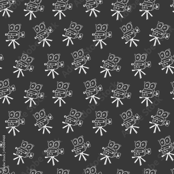 Fototapeta Seamless pattern background with doodle retro movie camera on a blackboard