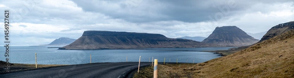Fototapeta High resolution panoramic view of mountains including Kirkjulfell mountain with road 54 in the foreground on the Snæfellsnes peninsula in Western Iceland.