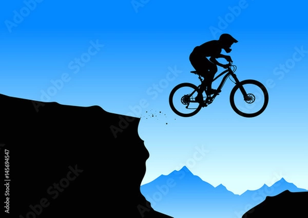 Obraz Silhouette of a biker jumping from mountain ledge