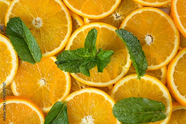 Fototapeta Pile of sliced oranges