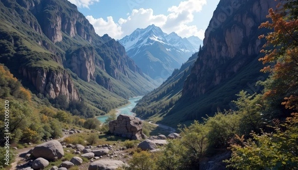 Fototapeta Exploring the breathtaking valley under majestic mountains with a serene river flowing through lush greenery during a sunny afternoon