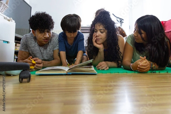 Obraz Family enjoying quality time reading together