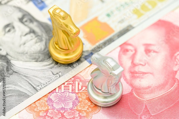 Fototapeta Trade war, reciprocal tariffs and global economic competition : Chess knight pieces on top of U.S. dollar and Chinese yuan notes, symbolizing the strategic economic rivalry between the US and China.