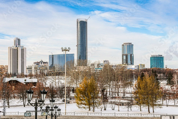 Obraz A city skyline with a tall building Iset Tower in the middle in Yekaterenburg in Russia