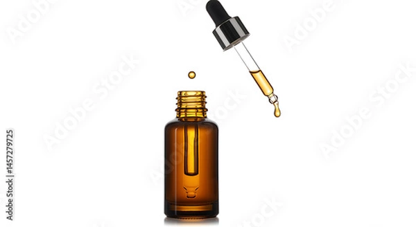 Fototapeta A single, precise drop of golden-yellow liquid, likely a cosmetic serum, essential oil, or tincture, falls from a glass pipette towards the opening of an open amber glass dropper bottle below