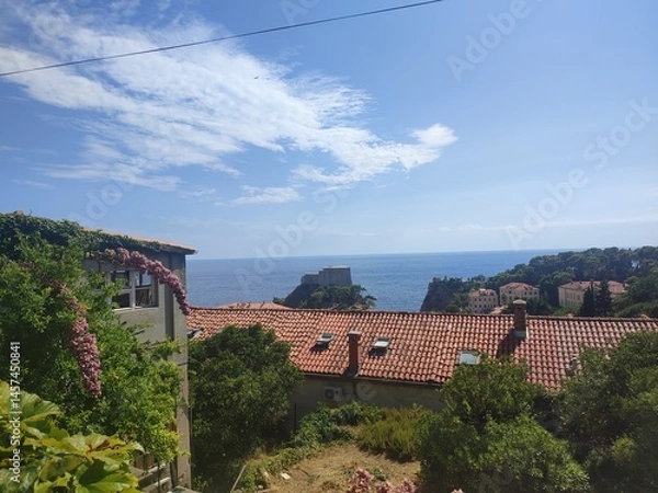 Fototapeta Scenic Coastal View with Red Tiled Rooftops and the Adriatic Sea in Dubrovnik, Croatia