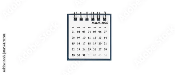 Fototapeta Desktop calendar for March 2026 in white colour. Mini planner for business and finance, spiral view on isolated white background close up.