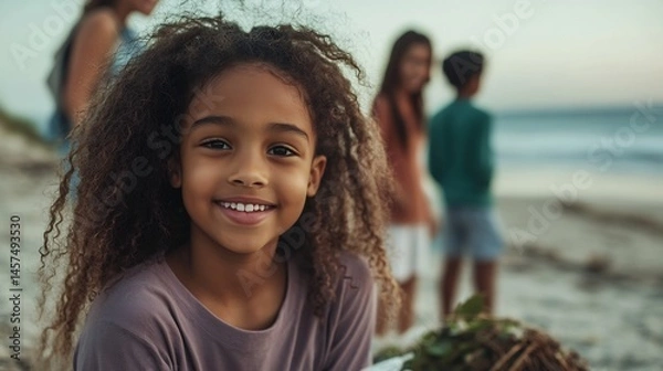 Obraz People cleaning beach together for environment