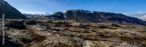 Fototapeta High resolution panoramic view of lava field under the Snæfellsjökull stratovolcano with the snow capped peak visible to the left. Snæfellsnes Peninsula in Western Iceland.