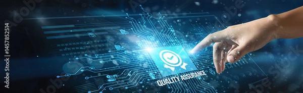 Fototapeta A businessman touching the icon and the word 'Quality Assurance' ensures products meet standards, improves processes, prevents defects, guarantees customer satisfaction, enhances reliability.
