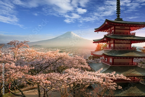 Fototapeta Fujiyoshida, Japan Beautiful view of mountain Fuji and Chureito pagoda at sunset, japan in the spring with cherry blossoms