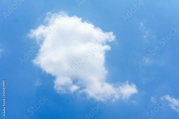 Fototapeta White clouds have the blue sky as the background.