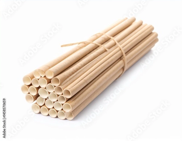Obraz Bundled light brown straws tied with twine, isolated against a white background