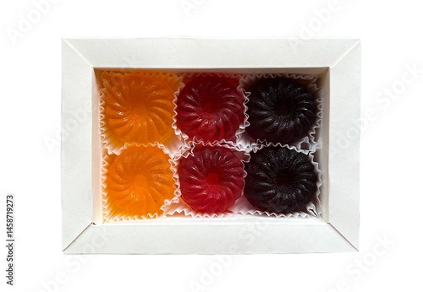 Obraz Fruit and berry marmalade in a white cardboard box. Isolated on white background.