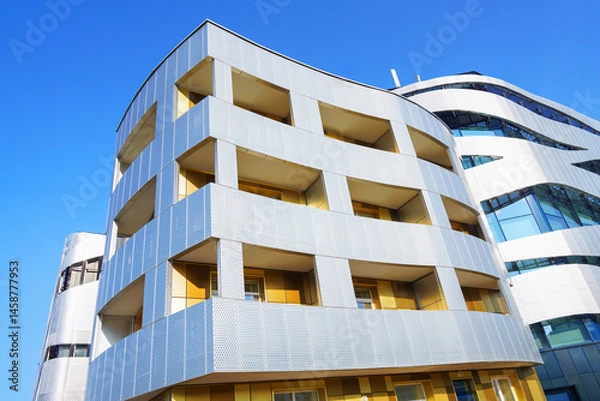 Obraz Futuristic building facade, background, texture. Modern architecture facade building with balconies.