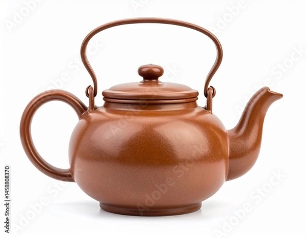 Fototapeta A brown ceramic teapot with a curved spout, handle, and lid sits on white