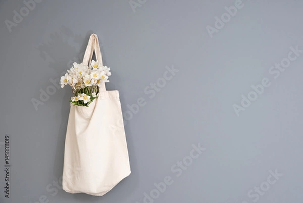 Fototapeta wildflowers in a reusable cloth vintage bag. Eco-friendly and natural. plastic-free and zero waste