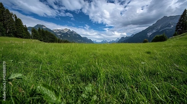 Fototapeta Lush green alpine meadow with towering mountains under a partly cloudy sky, offering a breathtaking view of the swiss alps. : Generative AI