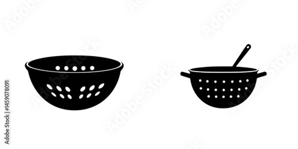 Fototapeta Kitchen utensils featuring a flat black colander and mixing bowl design for cooking and food preparation
