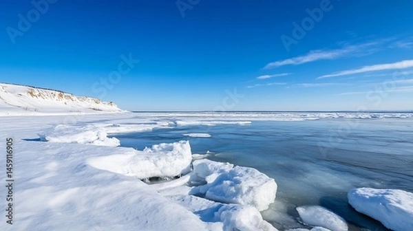 Fototapeta Stunning winter seascape featuring a snow-covered coastline, ice floes, and a clear blue sky, offering a serene and tranquil atmosphere. : Generative AI