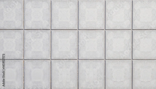 Fototapeta Decorative white tiles arranged in a clean geometric pattern  