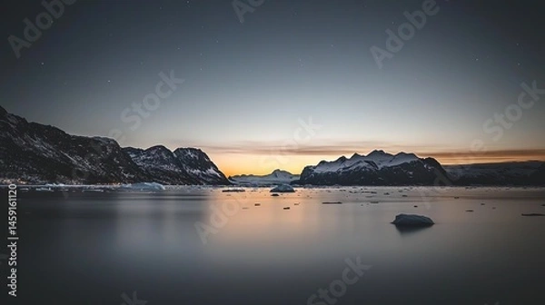 Fototapeta Glacial fjord at dawn, reflecting winter light.