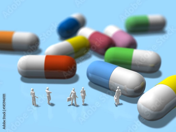 Fototapeta Business figures looking at colorful tablet capsules