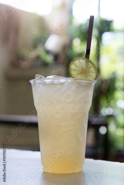Obraz lime juice in plastic cup