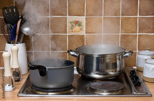 Obraz Pans boiling in a kitchen