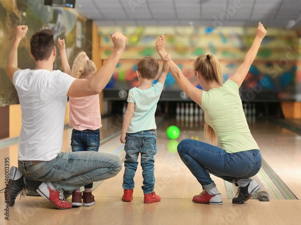 Obraz Family having fun at bowling club