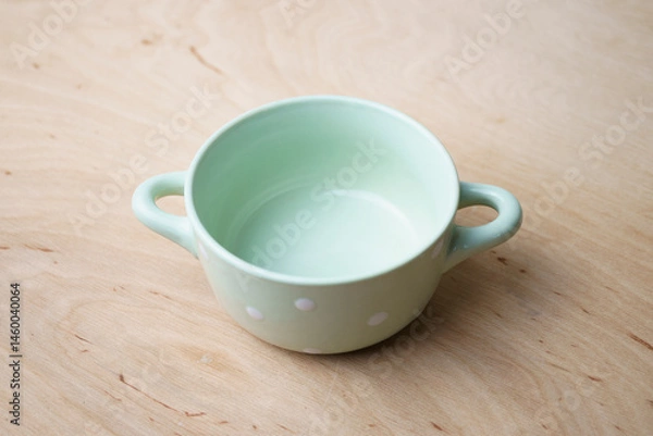 Fototapeta Close up of empty soup bowl, concept of nutrition and healthy cooking