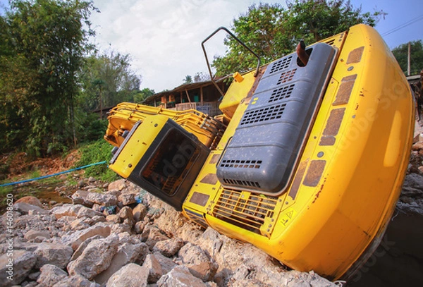 Fototapeta The backhoe is overturning at the construction site, Top Photos