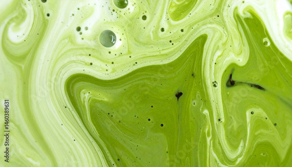 Fototapeta Green tea matcha mixing with milk texture background Food and drink close up
