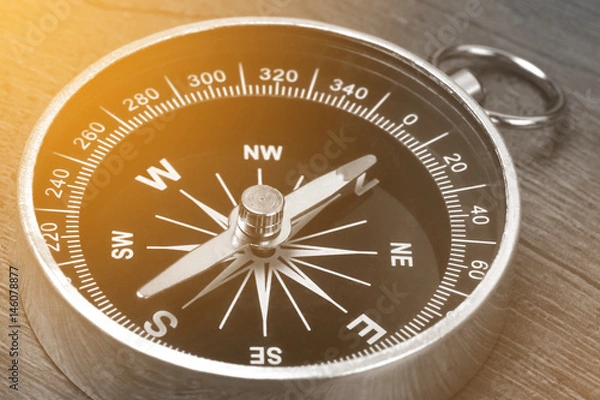 Obraz Old vintage retro compass on wooden background