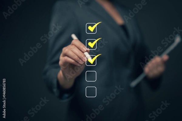 Obraz Reviewing and completing online survey forms document management system Assessment form, questionnaire, checklist and clipboard management Quality control...