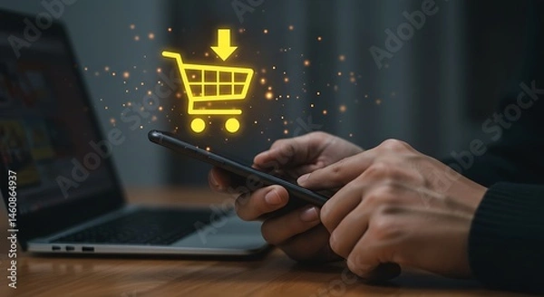 Fototapeta Hands holding a smartphone with an overlay of a digital shopping cart icon, signifying online buying