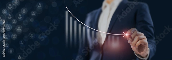 Obraz Business decline and workforce reduction concept. Staff downsizing, reduce manpower, and redundant labor. Drawing a downward trending graph, symbolizing financial loss, layoffs or workforce downsizing